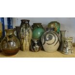 A collection of various studio pottery vases and other pottery including some vases by Jeremy