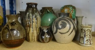 A collection of various studio pottery vases and other pottery including some vases by Jeremy