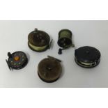 A collection of various fishing reels, assorted flies, weights, triple hooks, swivels etc.