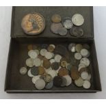 A vintage tin of general English coinage and historic medallions.
