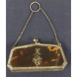 A 19th century silver tortoiseshell and inlaid purse.