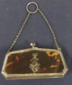 A 19th century silver tortoiseshell and inlaid purse.