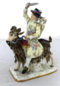 A Meissen Porcelain Figure of The Tailor, after the model by J J Kaendler, riding a goat, two kids