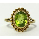 A 9ct peridot set ring, finger size L.