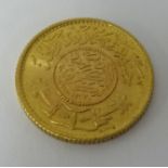 A high carat gold middle eastern coin and cufflinks, approx 15.60gms