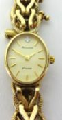 Accurist, a modern 9ct ladies wristwatch, approx 18.50gms.