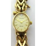 Accurist, a modern 9ct ladies wristwatch, approx 18.50gms.