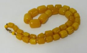 An yellow bead necklace, approx 71.40gms.