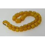 An yellow bead necklace, approx 71.40gms.