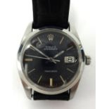 Rolex, a gents black dial Oyster date wrist watch, the case approx 34mm excluding crown with Rolex