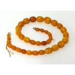 A small amber bead necklace, approx 22gms.