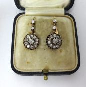 A pair of antique diamond set cluster earrings.