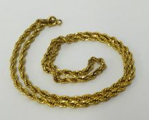 A yellow metal rope twist necklace, approx 12.80gms.