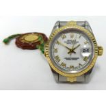 Rolex, a ladies steel and gold Oyster Date Just, with white dial and Roman numerals.