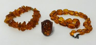 An amber bead necklace, approx 35.40gms together with an amber set ring (2).