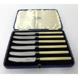 Set of six tea knives in fitted case.