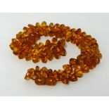 An amber bead necklace, approx 43.90gms.