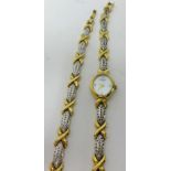 Rotary, a ladies fashion gilt decorative wristwatch and bracelet (2).