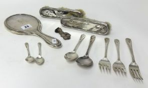A three silver back dressing table set and some loose silver spoons, coin bracelet etc.