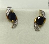 A pair modern 9ct sapphire and diamond dress earrings.