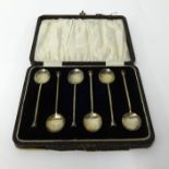 Six silver coffee apostle spoons and a single silver salt spoon, approx 1.86oz.