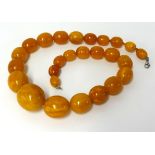 An amber style large bead necklace, approx 140gms.