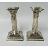Pair of Victorian silver candlesticks, London 'EH', with original sconces of column design height