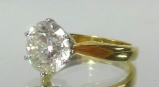 A fine 18ct fine diamond solitaire ring, the modern brilliant cut stone weighing approx 4 carats,