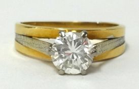 A diamond single stone ring, of good colour and clarity, set in yellow gold, approx 0.75 carats,