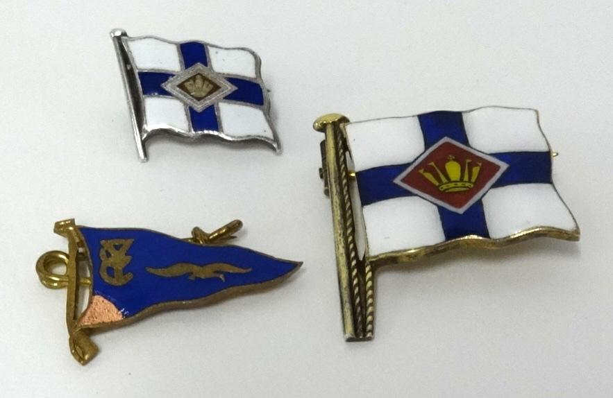 Benzie of Cowes, a Sterling silver signal flag brooch and two others including silver (3).