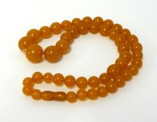 An amber style bead necklace, approx 68.30gms.