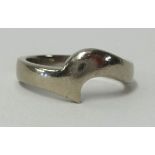 A white gold wedding band (to match lot 103), finger size K, approx 5.90gms.