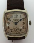 Rolex, a traditional small gents silver wrist watch dial inscribed 'Burford's, Exeter', with sub