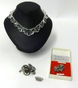 A 1930's crystal necklace and three items of silver jewellery.