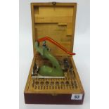 A Swiss Favorite Watchmaker's Staking Set with wooden case.