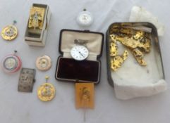 A quantity of pocket watch movements and assorted other items.