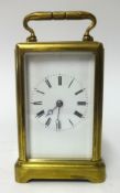 A French carriage clock with bell strike, striking on the hour and half hours, the enamel dial