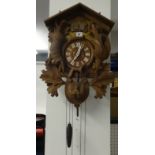 A reproduction ornate German cuckoo clock.