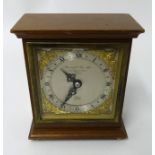 Elliott, a mahogany cased small mantle clock, the dial inscribed 'Garrard & Co, London', height