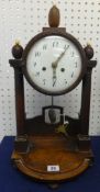 A 19th century portico style clock, with 8 day movement, height 50cm