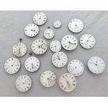 A quantity of pocket watch dials, movements etc.