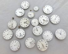 A quantity of pocket watch dials, movements etc.