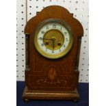 An Edwardian inlaid and oak cased bracket clock with eight day movement with gong strike, height