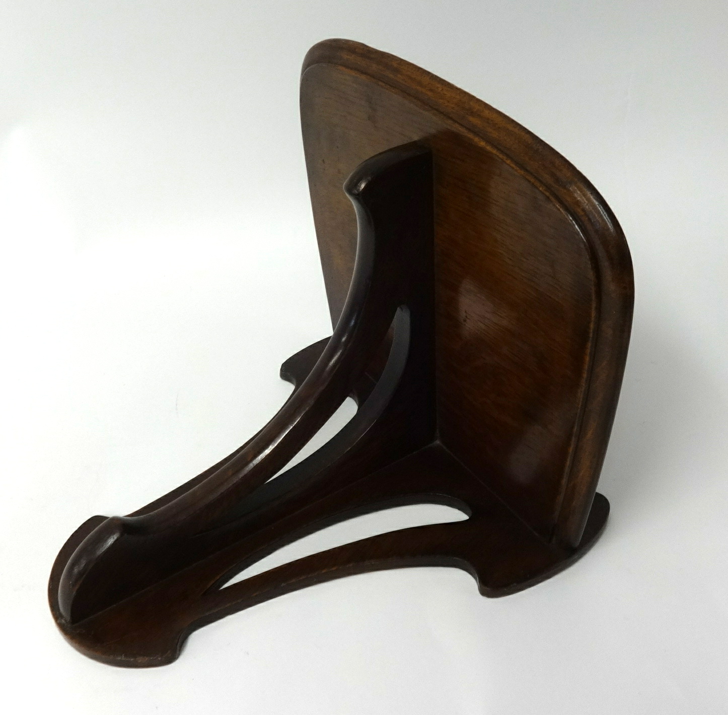 A mahogany wall bracket for a clock.