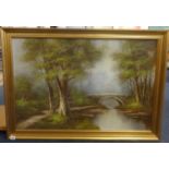 A modern signed painting, a traditional river scene, in gilt frame.