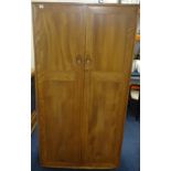 Ercol, a two door wardrobe.