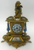 A French gilt mantle clock Sevres style porcelain panels, striking on a bell, P.MOUREY, 39cm