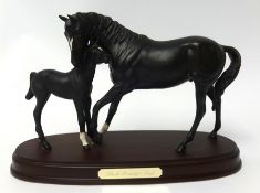 A Beswick model of 'Black Beauty & Foal' on wood base, 20cm