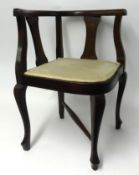 A pair of corner chairs.