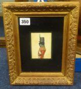 A 19th Century coloured silhouette of a Military Officer, also a small oil portrait of a lady